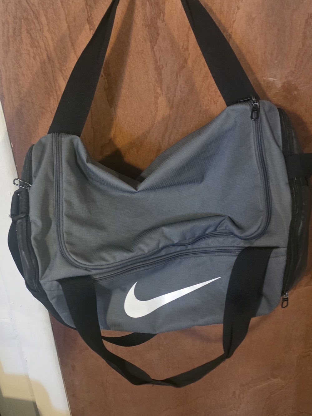 Nike Gray Duffel with White Swoosh and Black Straps